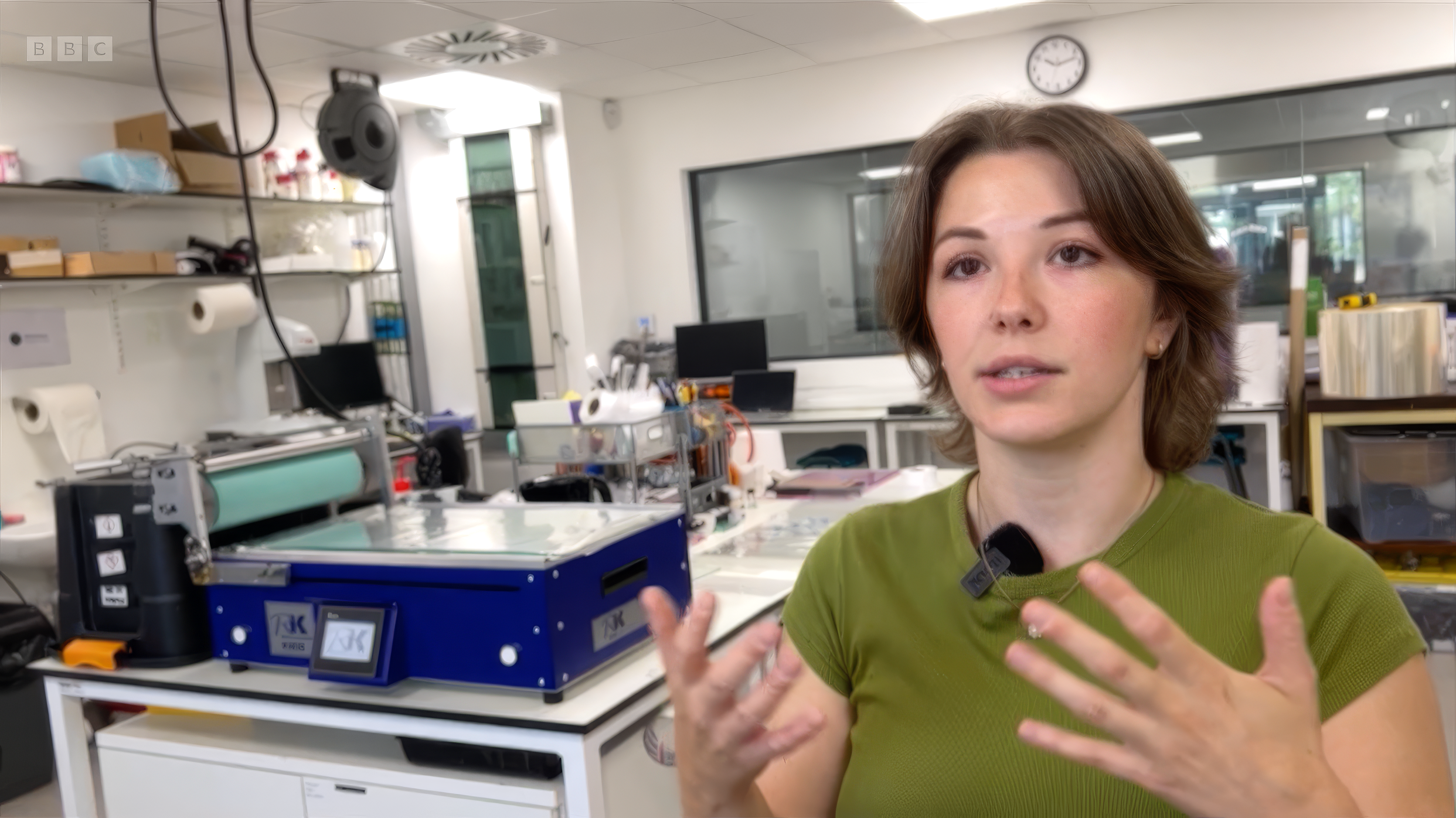 Molly Allington explaining Albotherm’s heat-activated glass technology to BBC Points West